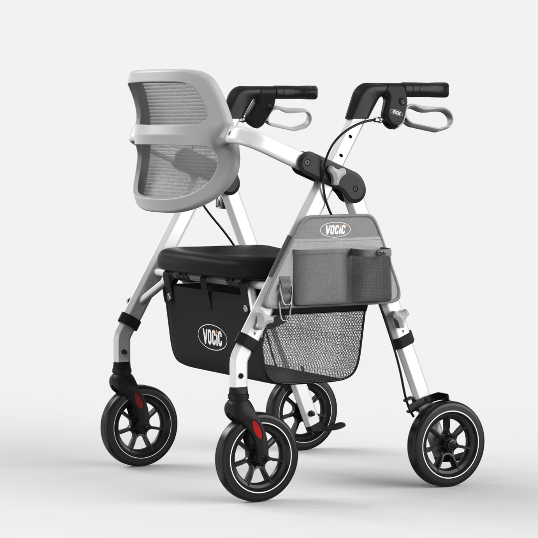 The ErgoGrand Bariatric Rollator Walker | VOCIC Z58 is a silver and black rollator with four wheels, featuring a cushioned seat, mesh backrest, storage baskets, and hand brakes for enhanced mobility assistance. For comprehensive information on dimensions and features, please refer to the product specification table.