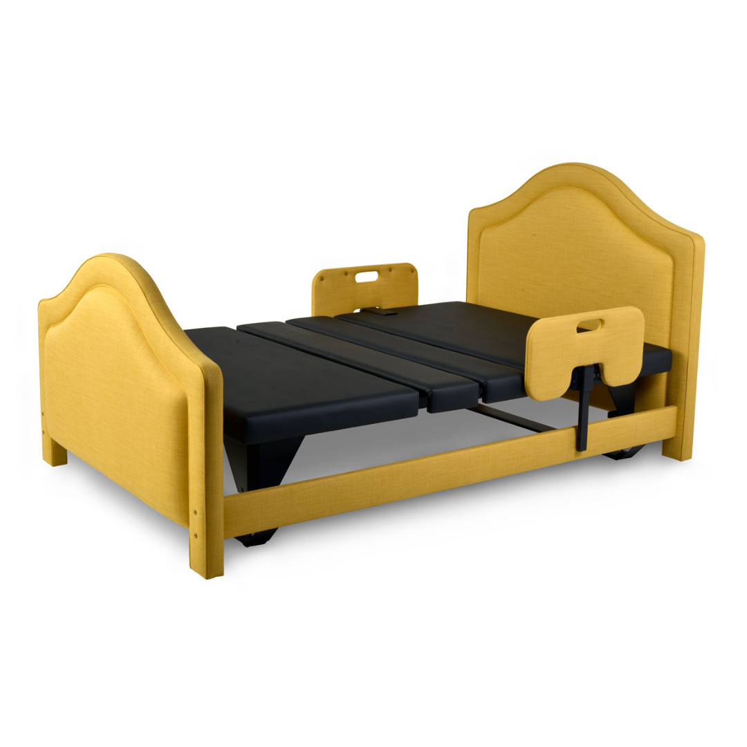 The Assured Comfort® Signature Series Hi-Low Adjustable Bed features a yellow frame, black cushioned sections, split mattress, and movable safety rails on both sides for enhanced accessibility and support.