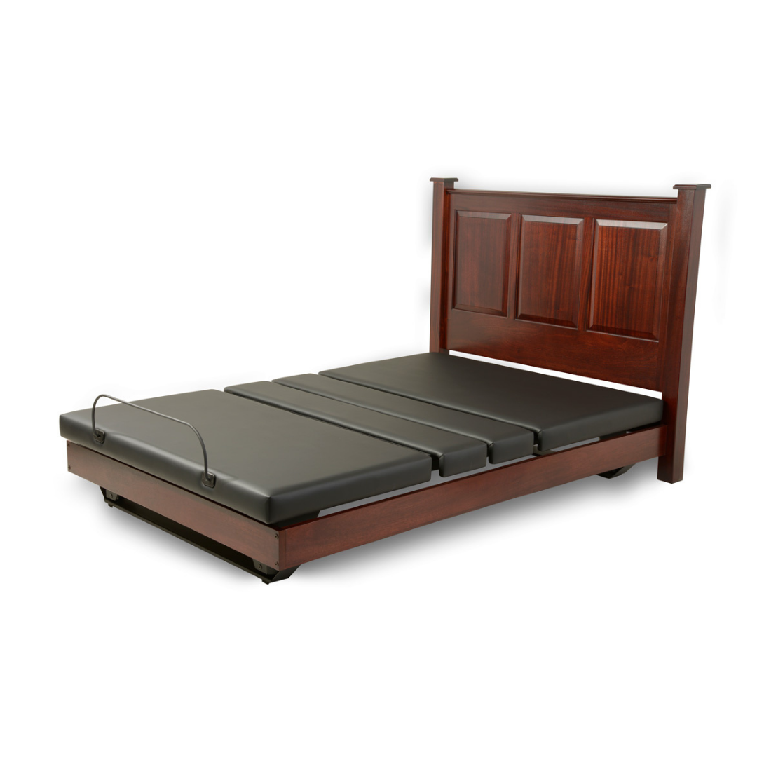 The Assured Comfort® Signature Series Hi-Low Adjustable Bed is a dark wooden split-king frame with a paneled headboard and split black mattress, allowing customized adjustments on each side.
