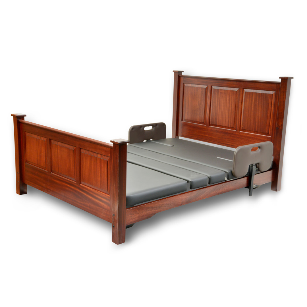 The Assured Comfort® Signature Series Hi-Low Adjustable Bed includes a brown wooden frame, gray split mattress, and adjustable safety rails on each side, ideal for accessibility or medical needs.