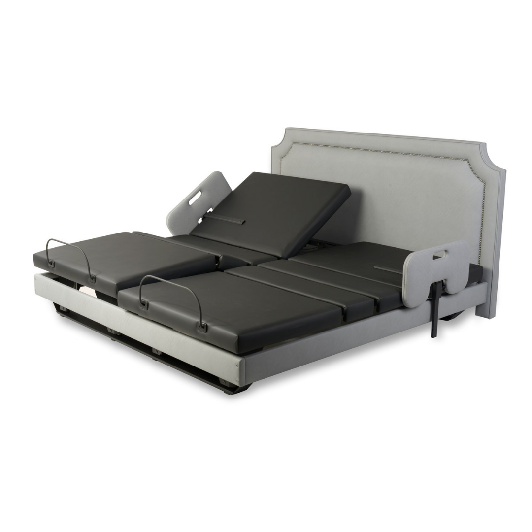 The Assured Comfort® Signature Series Hi-Low Adjustable Bed features a padded headboard, split-section reclining for head and legs, and cushioned side rails for superior support, comfort, and safety.