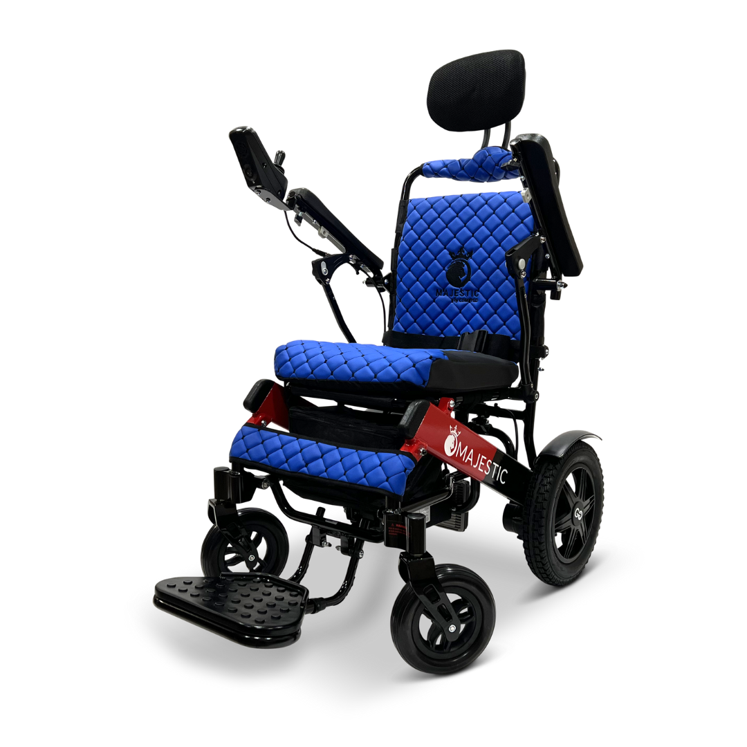 The ComfyGo MAJESTIC IQ-9000 Auto Recline Remote Controlled Electric Wheelchair, in blue and black, features a comfortable padded seat and headrest. It's equipped with a digital joystick controller and brushless silent motors for smooth operation, sturdy wheels, a folding footrest, and displays Magic Mobility branding on the side.