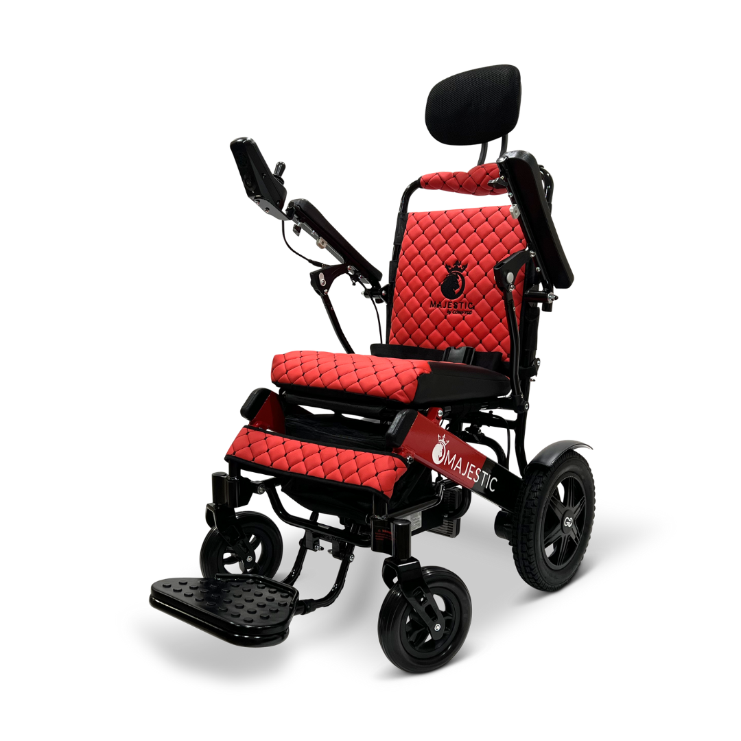 The ComfyGo MAJESTIC IQ-9000 Auto Recline Remote Controlled Electric Wheelchair in red and black comes with quilted upholstery, foldable armrests, an adjustable headrest, large rear wheels, smaller front wheels, a digital joystick controller for precise navigation, and brushless silent motors for seamless mobility.