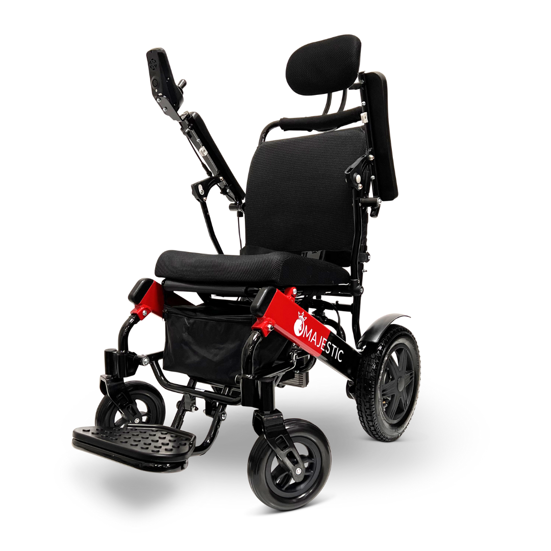 The ComfyGo MAJESTIC IQ-9000 Auto Recline Remote Controlled Electric Wheelchair, featuring a vivid black and red design, comes with a cushioned seat, backrest, footrest, and rear wheels. It is equipped with a digital joystick controller on the armrest for easy navigation. The wheelchair is powered by brushless silent motors and displays the MAJESTIC logo prominently on its side.
