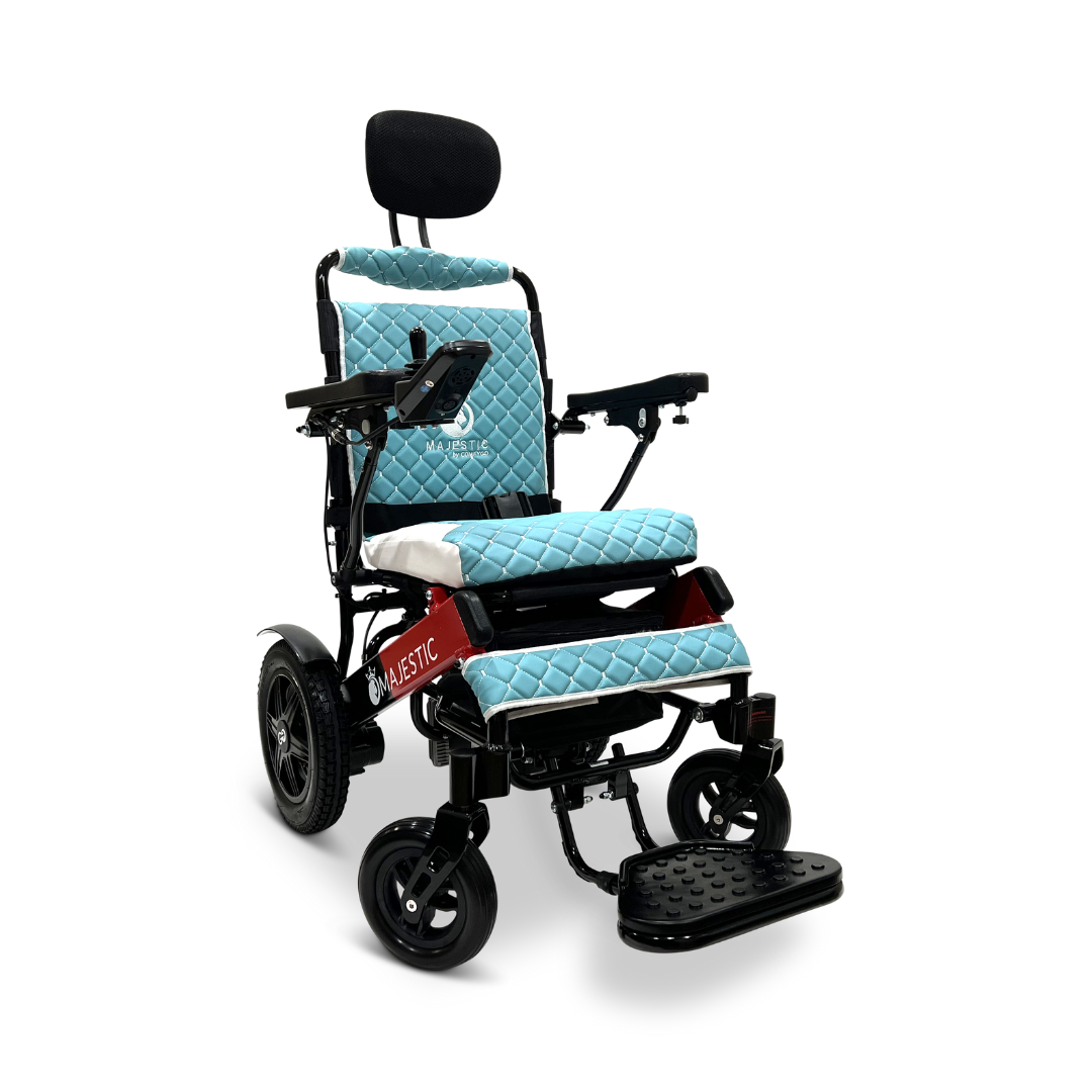 The ComfyGo MAJESTIC IQ-9000 Auto Recline Remote Controlled Electric Wheelchair is a lightweight and foldable electric wheelchair featuring a black frame and light blue diamond-patterned, padded cushions. It includes brushless silent motors, large back wheels, small front wheels, a digital joystick controller, and a headrest for optimal comfort and mobility.