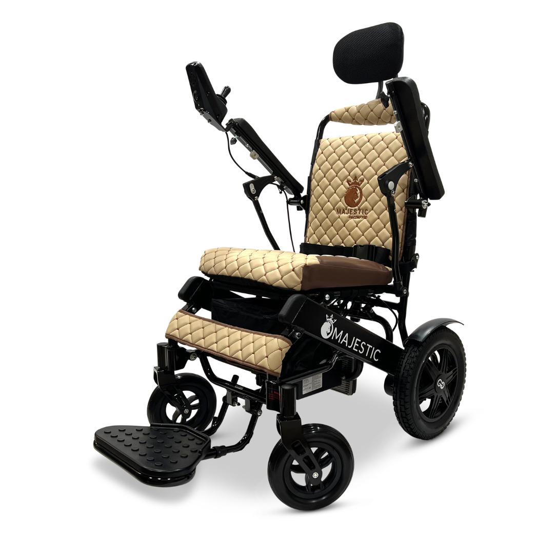 Introducing the ComfyGo MAJESTIC IQ-9000 Auto Recline Remote Controlled Electric Wheelchair, an electric marvel with beige quilted upholstery and a sleek black frame. Equipped with brushless silent motors, a digital joystick controller, and detachable footrests, it offers unparalleled comfort and mobility.