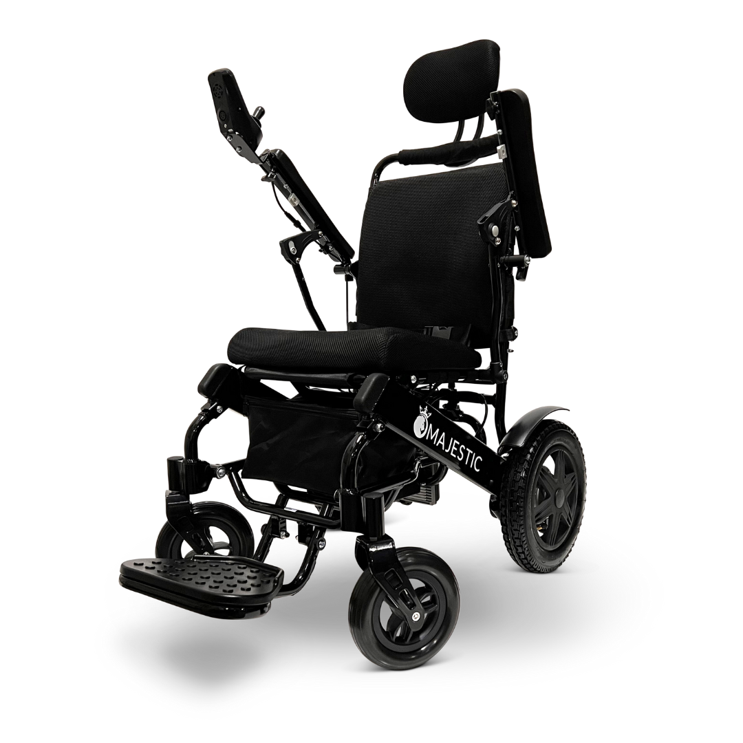 A sleek, black ComfyGo MAJESTIC IQ-9000 Auto Recline Remote Controlled Electric Wheelchair with a foldable design is showcased. It features brushless silent motors, a padded seat and backrest, large rear wheels, smaller front wheels, and a digital joystick controller on the armrest. The brand name Majestic is prominently displayed on the side.