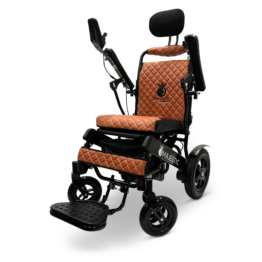 Introducing the ComfyGo MAJESTIC IQ-9000 Auto Recline Remote Controlled Electric Wheelchair, a stylish model with brown quilted leather cushions and a black frame. This wheelchair features brushless silent motors, a digital joystick controller, large rear wheels, small front wheels, adjustable armrests, a cushioned headrest, and an extending footrest.