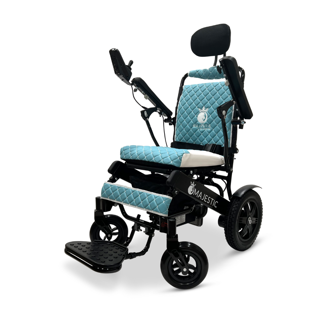 The ComfyGo MAJESTIC IQ-9000 Auto Recline Remote Controlled Electric Wheelchair features a stylish black frame with turquoise quilted cushions, complete with a headrest, armrests, and footrest. It is equipped with brushless silent motors and a digital joystick controller for seamless navigation.