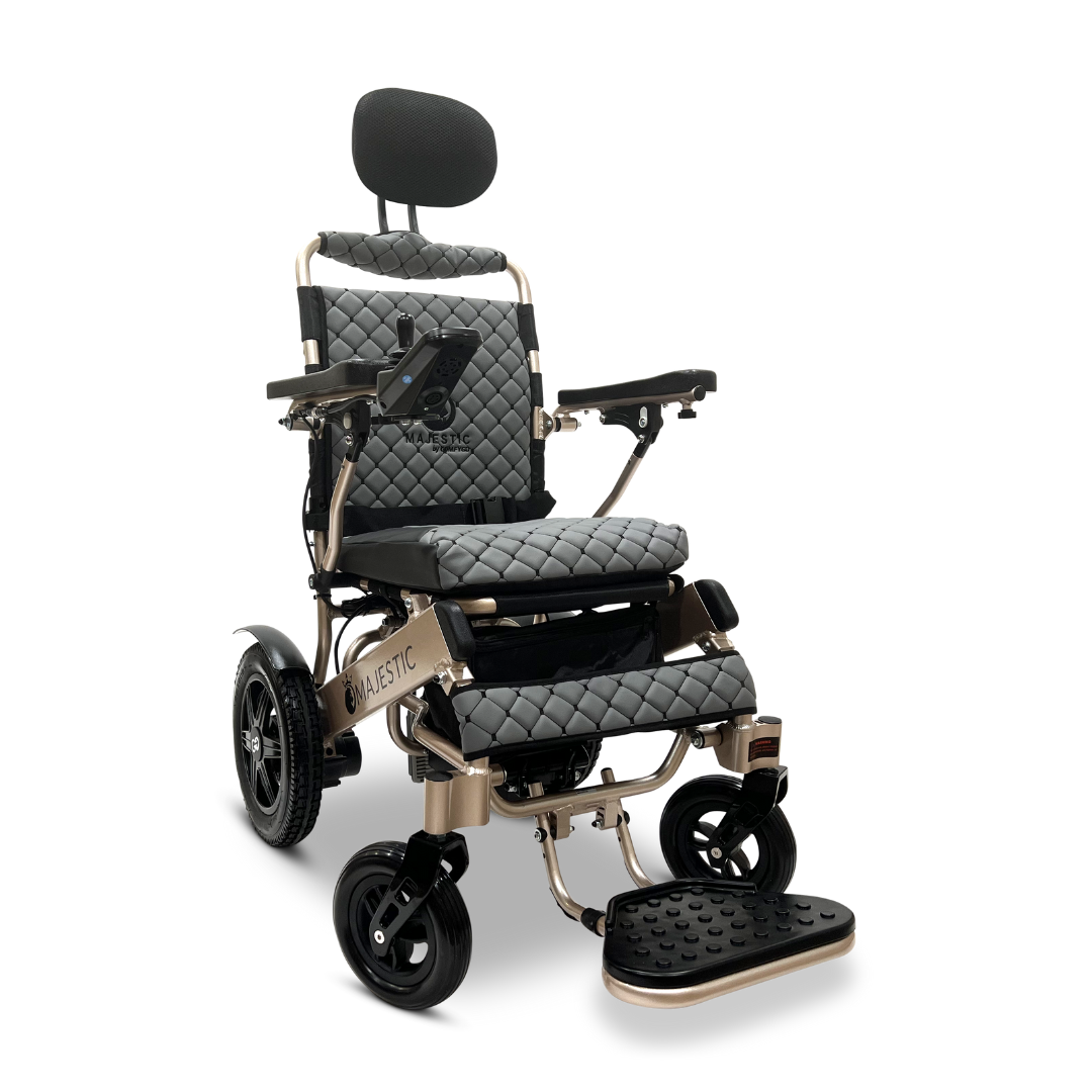 Introducing the ComfyGo MAJESTIC IQ-9000 Auto Recline Remote Controlled Electric Wheelchair, a sleek and modern electric marvel with a quilted black and gold design. It features a cushioned seat and headrest, digital joystick controller on the armrest, brushless silent motors for smooth rides, and boasts two large rear wheels and two smaller front wheels.