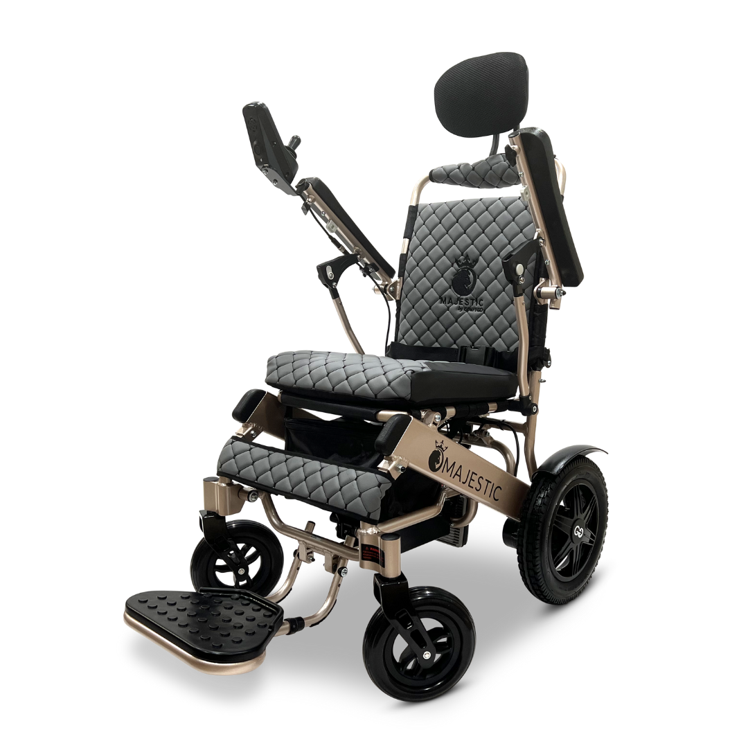 Introducing the ComfyGo MAJESTIC IQ-9000 Auto Recline Remote Controlled Electric Wheelchair, featuring a sleek, modern design with a quilted black seat and backrest. It comes with adjustable armrests and footrest, equipped with brushless silent motors and a digital joystick controller for smooth navigation. The sturdy wheels proudly display Majestic branding.