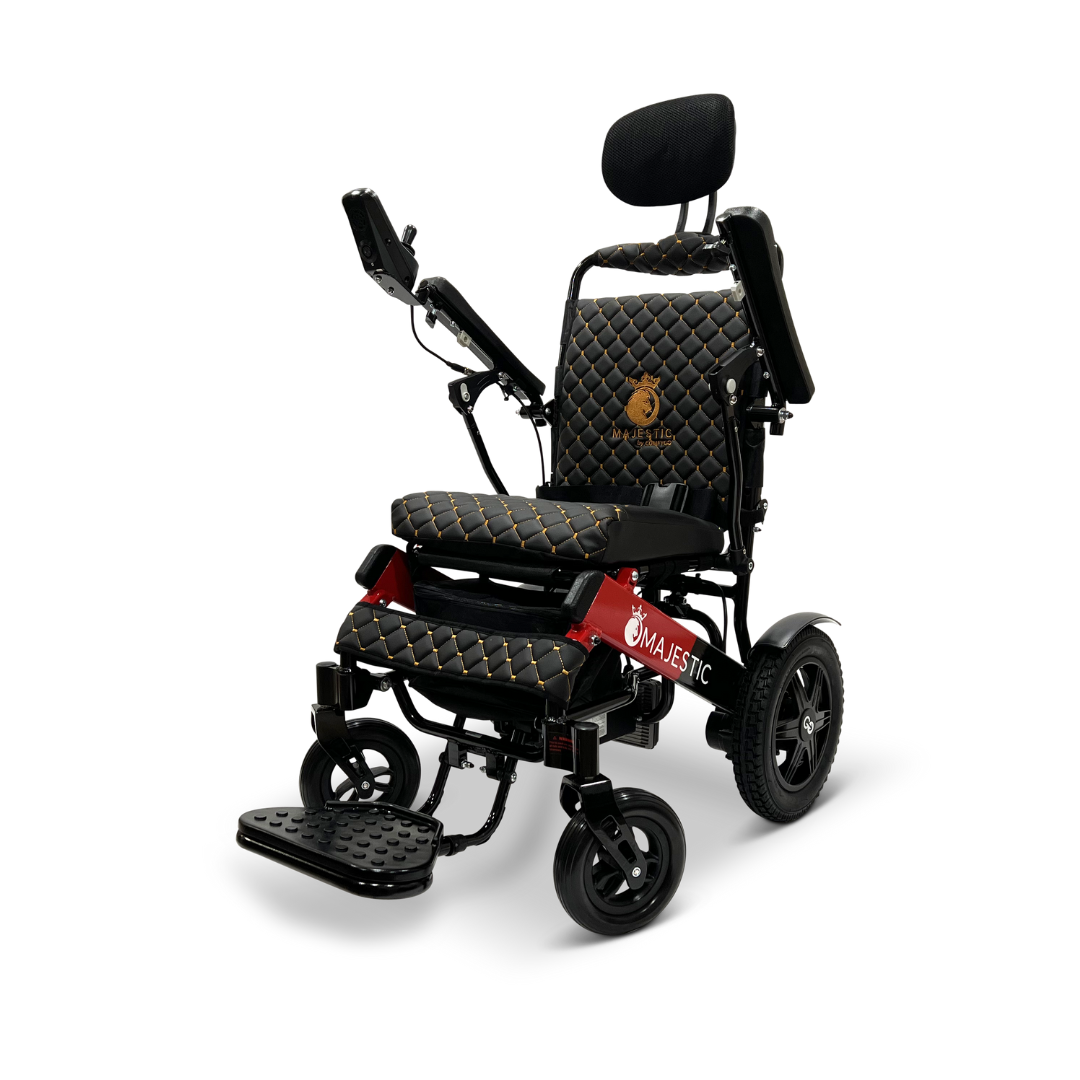 The ComfyGo MAJESTIC IQ-9000 Auto Recline Remote Controlled Electric Wheelchair by Majestic features a stylish black and gold design, equipped with a headrest and adjustable armrests. It offers quilted cushioning, a footrest, two large back wheels for enhanced stability, brushless silent motors, and an intuitive digital joystick controller.