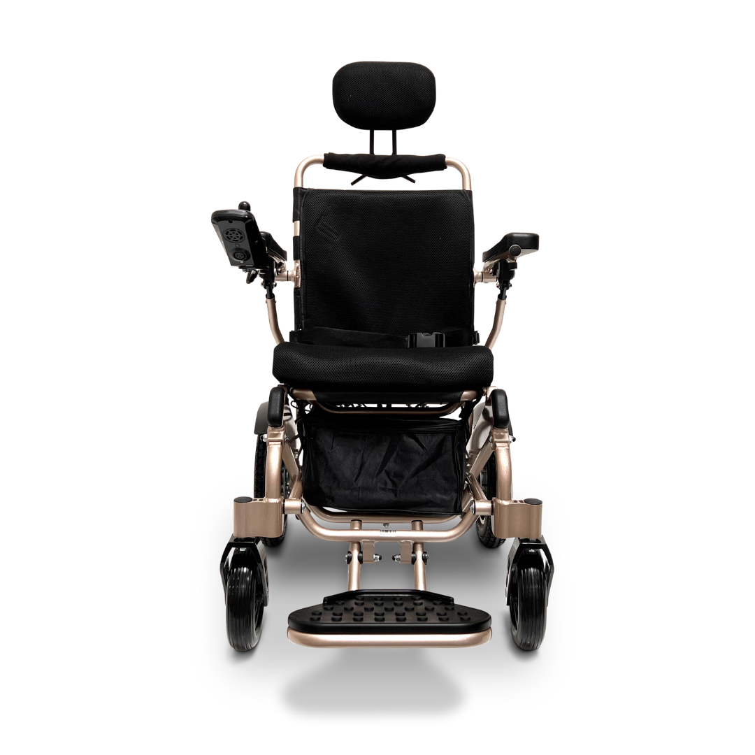 A front view of the ComfyGo MAJESTIC IQ-9000 Auto Recline Remote Controlled Electric Wheelchair highlights its contemporary design, complete with a black seat, headrest, and armrests. It is equipped with a digital joystick controller on the right armrest, brushless silent motors for ultra-quiet performance, and large rear wheels engineered for enhanced mobility and comfort.