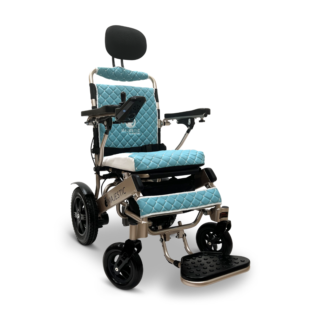 The ComfyGo MAJESTIC IQ-9000 Auto Recline Electric Wheelchair features a sleek blue cushioned seat and backrest, black armrests with a joystick controller, headrest, black wheels, metallic frame, and an adjustable footrest for easy navigation.
