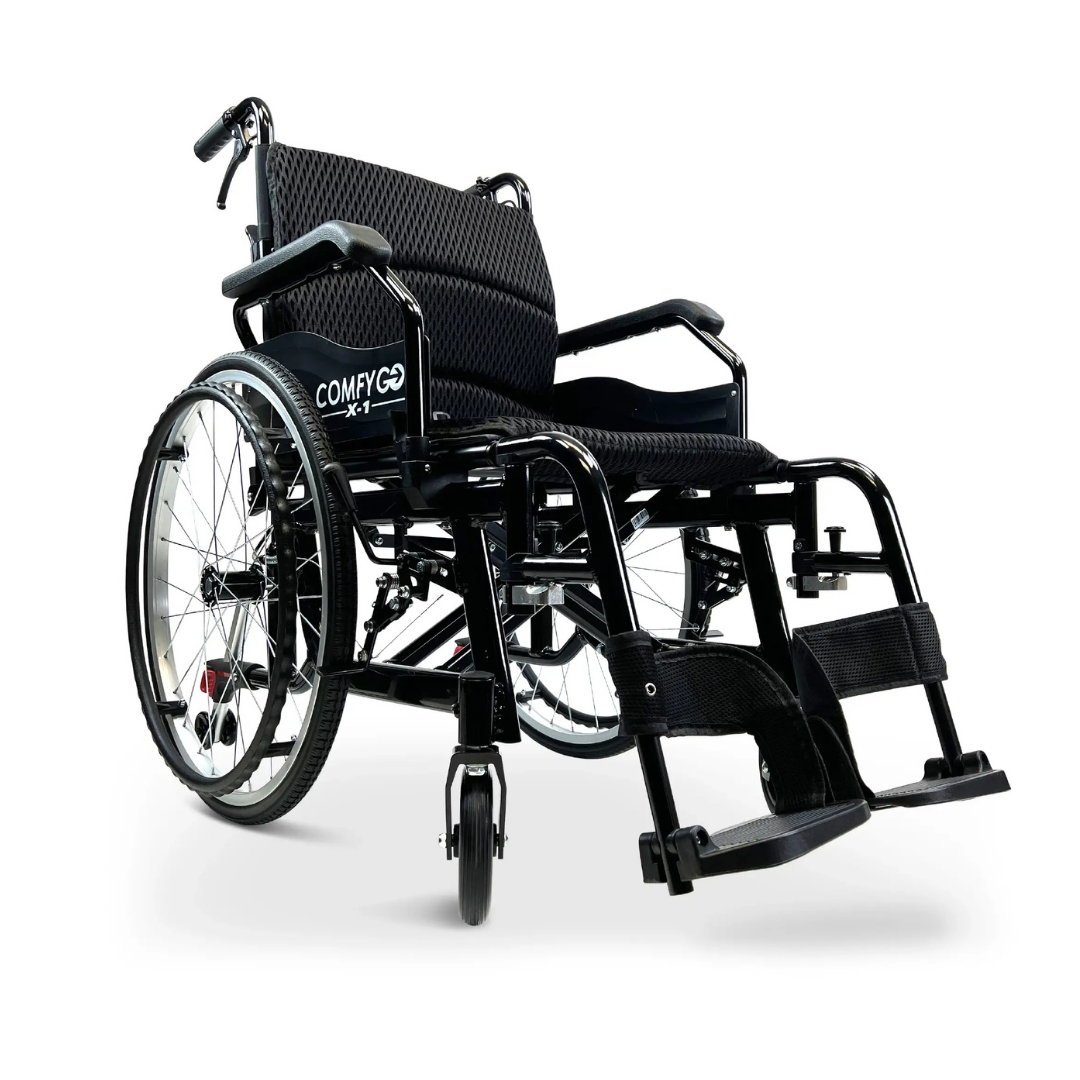 The ComfyGo X-1 Lightweight Manual Wheelchair - Open Box Slightly Used features large rear and small front wheels, cushioned seat and backrest, armrests, footrests, and displays the COMFYGO X1 brand on its side.
