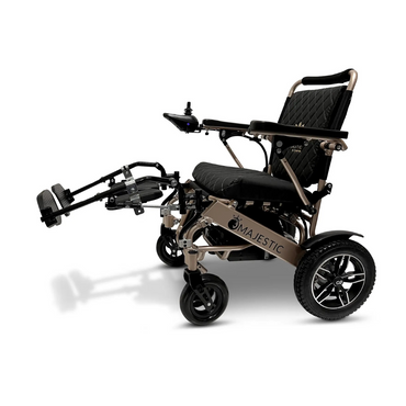 Lightweight, foldable electric wheelchair with ComfyGo Elevating Legrest Set (compatible with IQ-8000 and IQ-9000), black quilted seat and backrest, right-arm joystick control, sturdy wheels, and Majestic branding on the frame.