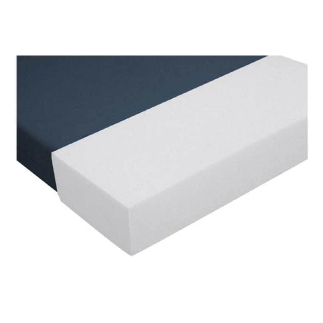 A close-up of the Drive High-Density Bariatric Foam Mattress with Cover, featuring a white foam base and a dark blue fabric top, shown against a white background.