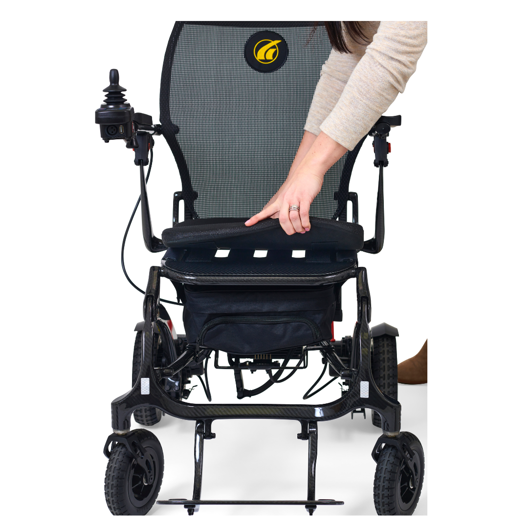 attaching the seat with velcro straps to the Golden Tech Carbon Fiber Cricket Power Wheelchair