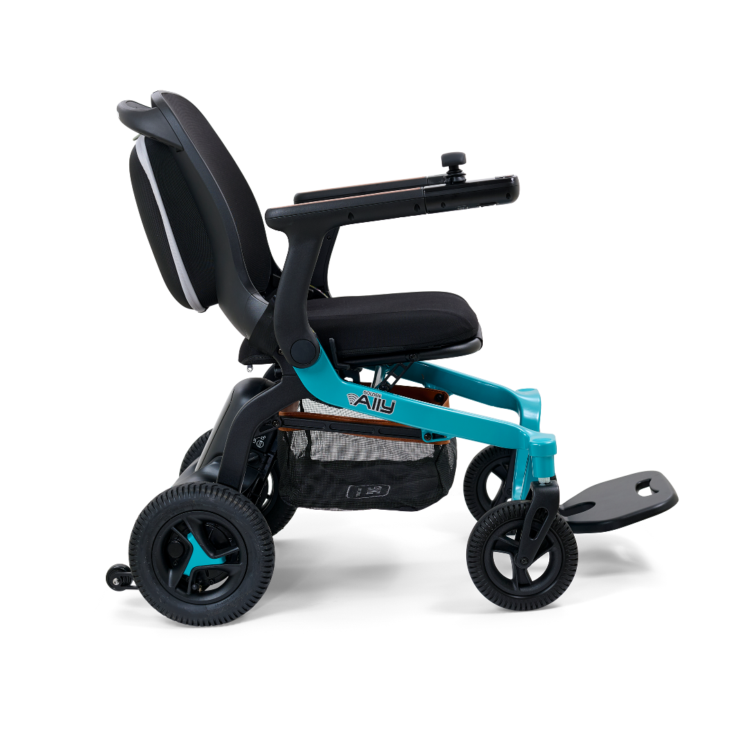 The Golden Tech Ally Folding Power Wheelchair combines a sleek black seat, armrests, turquoise frame, rear suspension, footrests, and compact front wheels. Ideal for travel with Smart Control Mobile App integration for easy use.