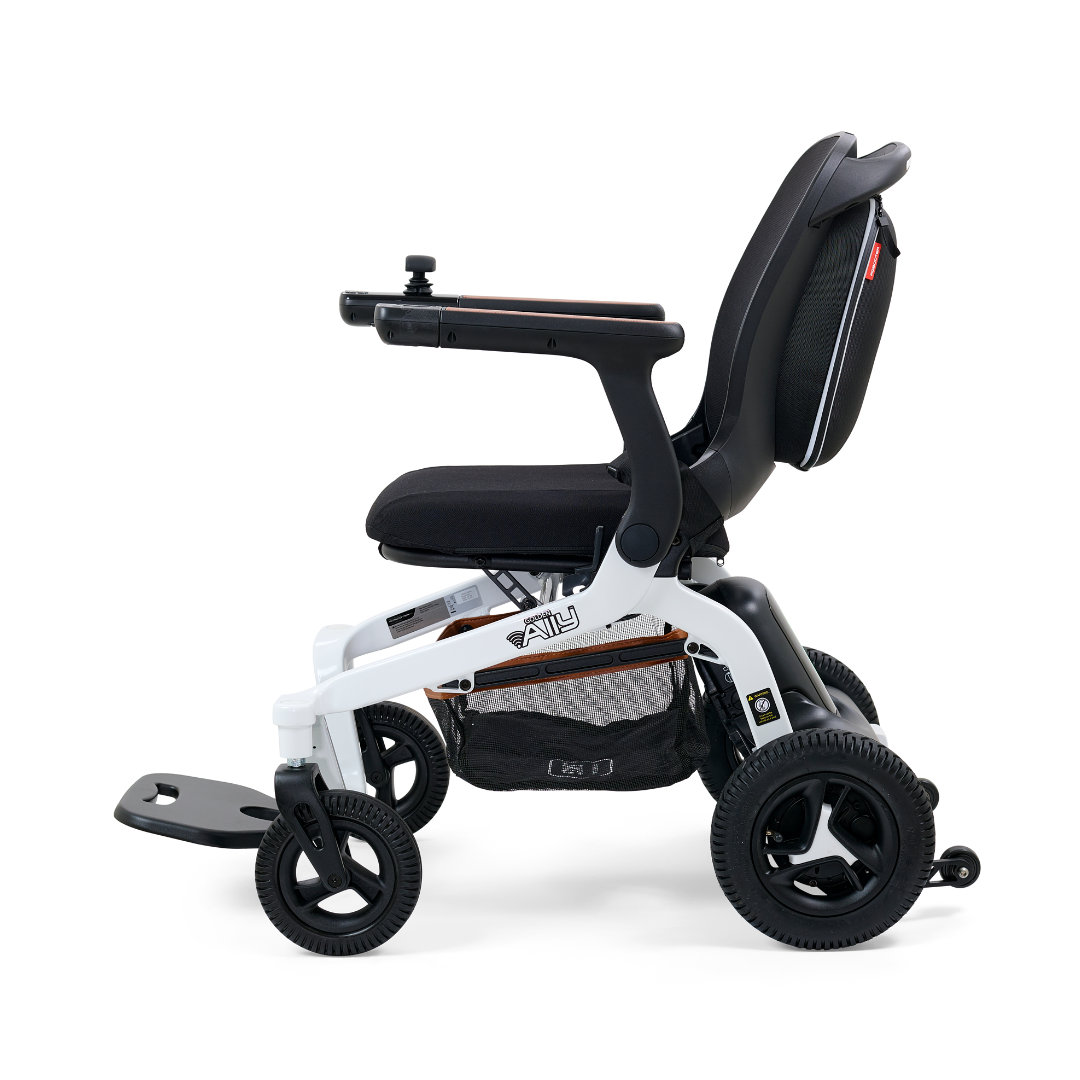 The Golden Tech Ally Folding Power Wheelchair is perfect for travel with a sleek white frame, black seat, large rear wheels, small front wheels, and right-armrest joystick. Easily manage it using the Smart Control Mobile App.