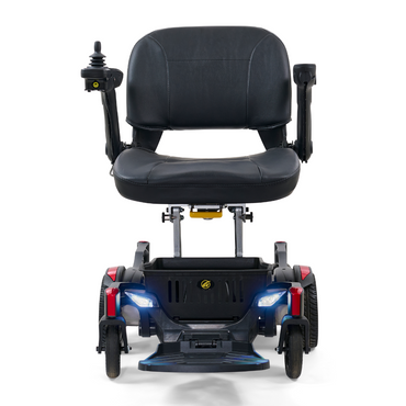 The Golden Tech GP130 Buzzaround CarryOn Portable Powerchair showcases a front view with a black cushioned seat, armrests, and a right-hand joystick. It features four wheels, LED lights on the front pair, and is designed for personal transportation and accessibility.