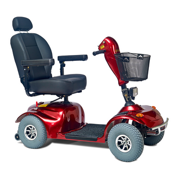 The Golden Tech Avenger HD Bariatric Mobility Scooter is red with a cushioned black seat, armrests, and handlebars. It has four wheels and a front wire basket, designed for easy accessibility and comfort on rugged terrain.