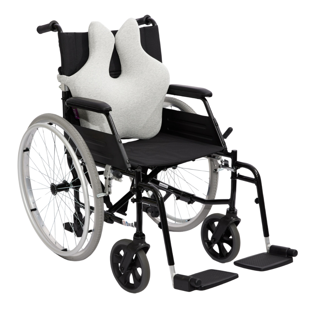 The iCare Reform Full Back Support offers ergonomic relief with a gray cushion featuring raised side supports and charcoal-infused ActiveX foam. The black manual wheelchair includes large rear wheels, small front wheels, full back support, and footrests.