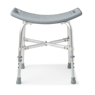 The Medline Bariatric Shower Chair without Back supports up to 550 lbs, featuring a gray curved seat, adjustable aluminum legs, and rubber tips for stability—offering slip-resistant safety and support in the bathroom.