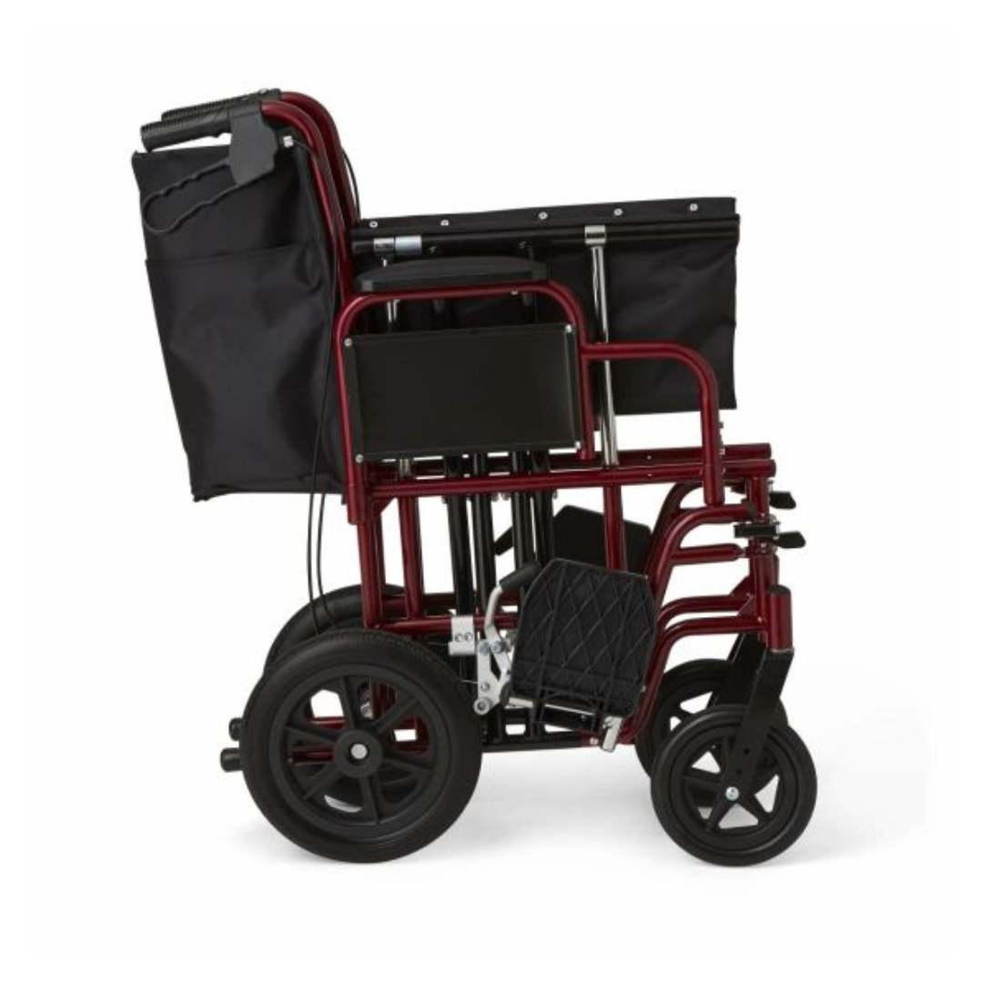 The Medline Bariatric Transport Chair features a durable aluminum frame, black seat, backrest, and swing-away footrests. It has large rear wheels and smaller front wheels for easy transport or storage, plus a convenient black carrying bag at the back.