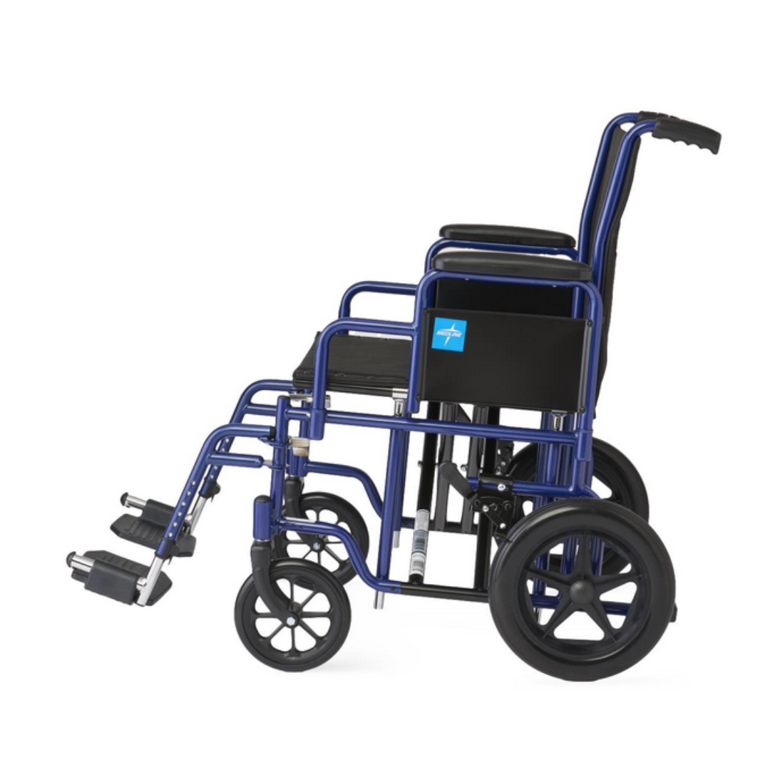 The Medline Folding Bariatric Transport Chair is shown in a side view, highlighting its heavy-duty, high-weight capacity design. It features a blue frame with black seat and armrests, handlebar for pushing, rear wheels with hand rims, and two smaller front wheels with swing-away footrests.