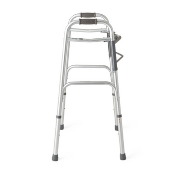 The Medline Two-Button Adult Folding Walkers without Wheels provides a silver metal mobility solution with black padded handgrips and four rubber-tipped, height-adjustable legs, delivering a simple yet sturdy support for improved mobility.