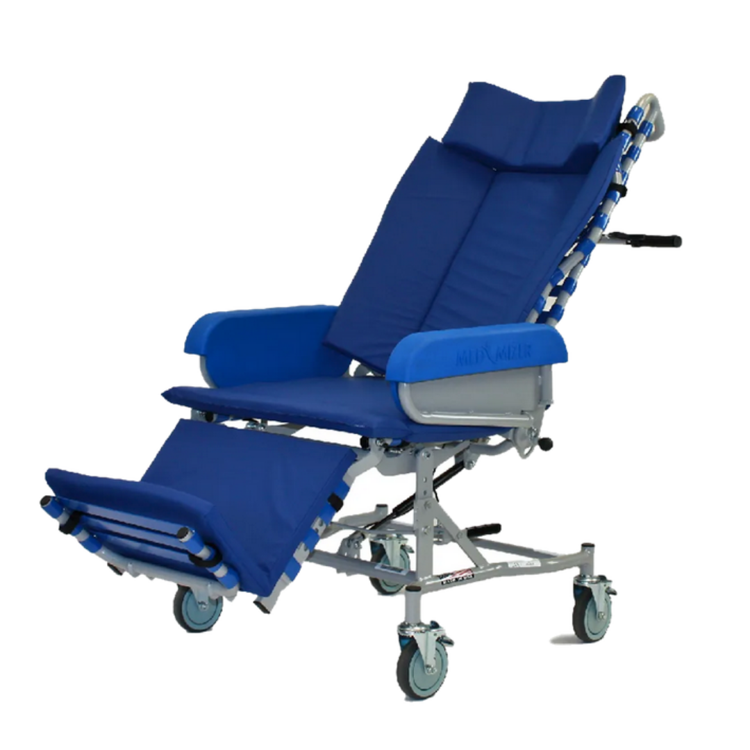 The Med-Mizer FLEXTILT Reclining Transfer Chair is a blue, padded medical chair with adjustable backrest, leg support, armrests, and four wheels for comfort and easy patient transport in healthcare settings.