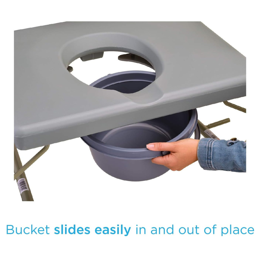A hand in a denim sleeve effortlessly slides the gray Nova Bariatric Bedside Commodes heavy-duty bucket in and out from under its extra wide, drop-arm seat.