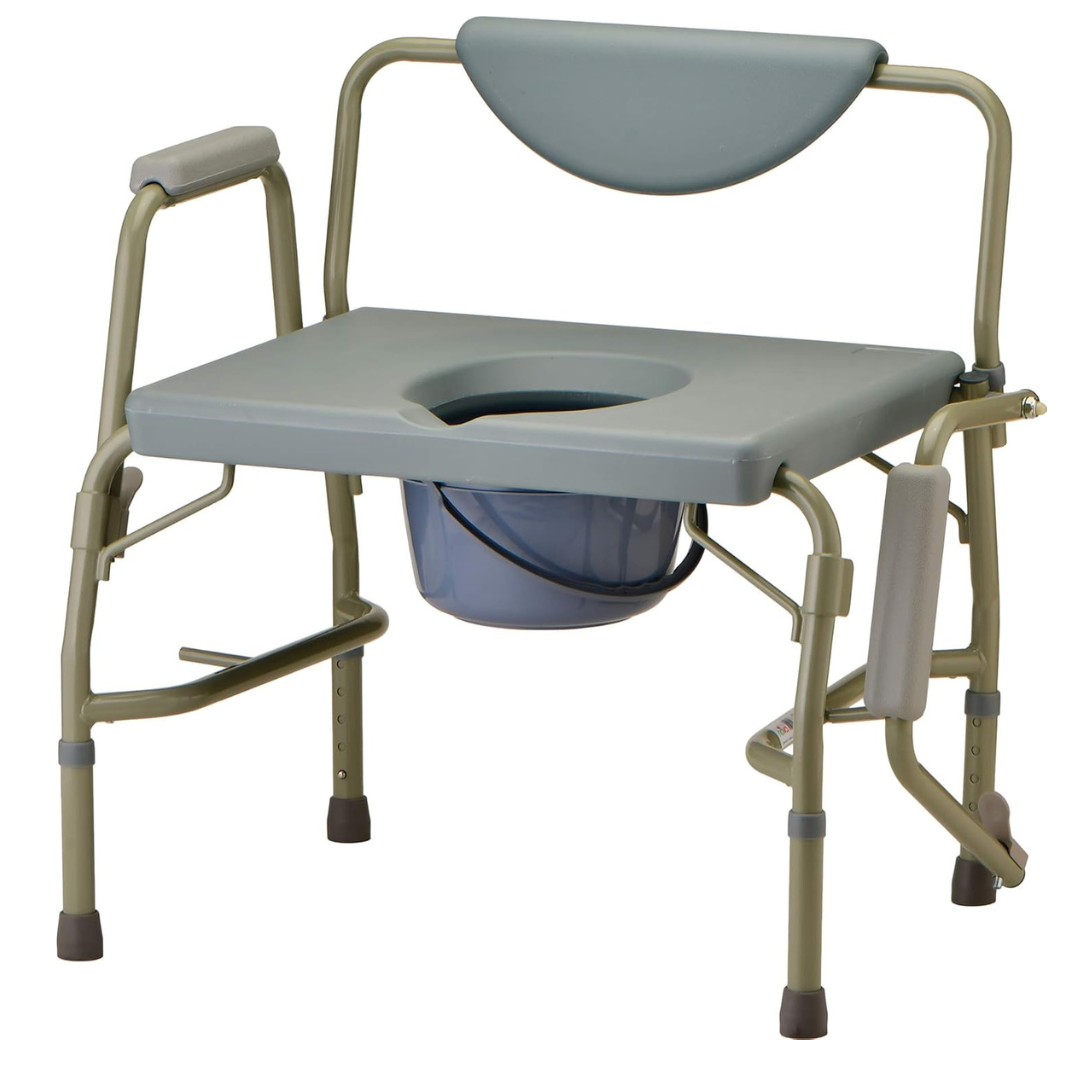 The Nova Bariatric Bedside Commode features a gray and beige drop-arm design for support and accessibility, with adjustable legs, padded elements, removable seat cover, sturdy armrests, and a bucket below—perfect as an extra wide heavy-duty bedside commode chair.