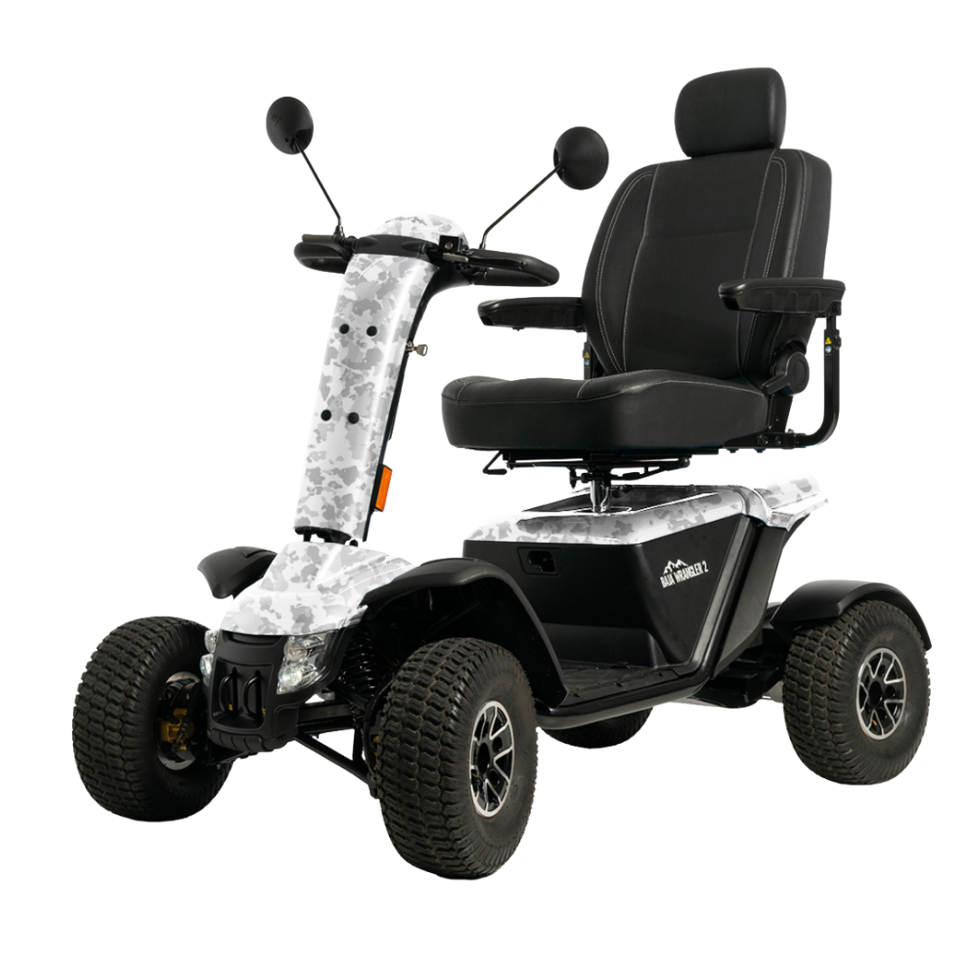 The Pride Baja® Wrangler® 2 Heavy Duty Outdoor Scooter features four large all-terrain tires, a cushioned seat with armrests and headrest, rearview mirrors, and camouflage-patterned front and side covers for outdoor use.