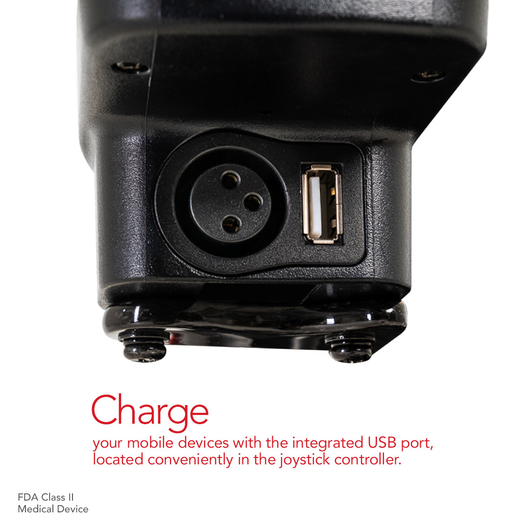 Close-up of the joystick controller with USB and round connectors on the Pride Mobility Jazzy® Carbon Ultralite Powerchair. Text: Conveniently charge your mobile devices via the integrated USB port located in the joystick. FDA Class II Medical Device.