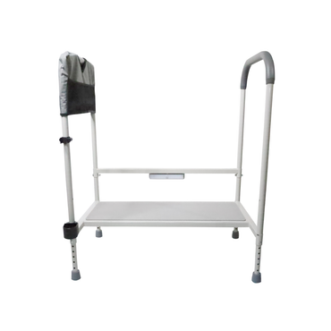 The Step2bed Deluxe Bedside Step-Up Platform with Accessory Kit is a white adjustable bed safety rail featuring gray padded handles, a small pouch, and rubber-tipped legs—shown isolated on a white background.