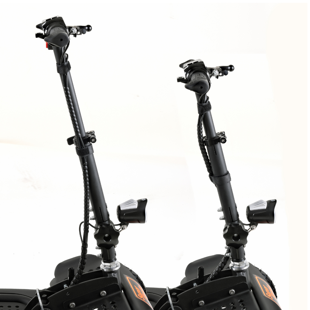Close-up of SuperHandy Explorer Mobility Scooter handlebars with textured grips, digital display, and brake levers. Each stem, featuring a coil design, has a headlight. These scooters have durable pneumatic wheels and a powerful 500W motor against a white background.
