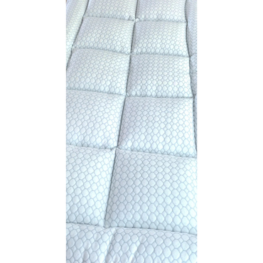 Close-up of the 2" CoolCloud™ Down Alternative Topper for Elevra beds, featuring a white, quilted hexagonal pattern with rectangular stitching. The cushioned surface is soft and hypoallergenic, perfect for added comfort.