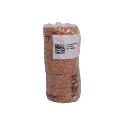 The 3M™ Coban™ Self-Adherent Elastic Wrap Bandage 1” x 5 yd – Tan is wrapped in clear plastic with a white label showing a QR code, barcodes, and product details, ideal for effective wound care.