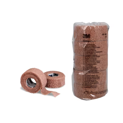 Two 3M™ Coban™ Self-Adherent Elastic Wrap Bandage rolls (1” x 5 yd, tan): one sealed in plastic, the other partially unrolled to display its textured surface—perfect for wound care and secure compression.