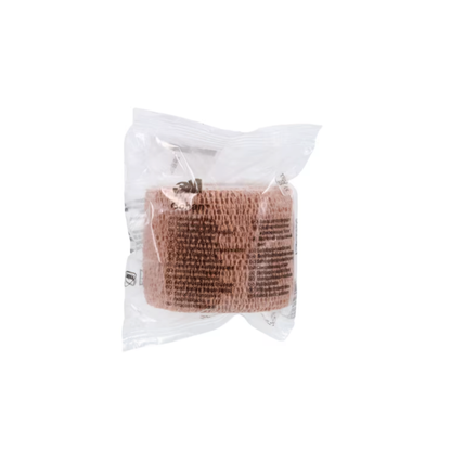 A roll of 3M Coban Wrap Elastic Bandage in tan, wrapped in clear plastic with black text, is displayed against a plain white background.