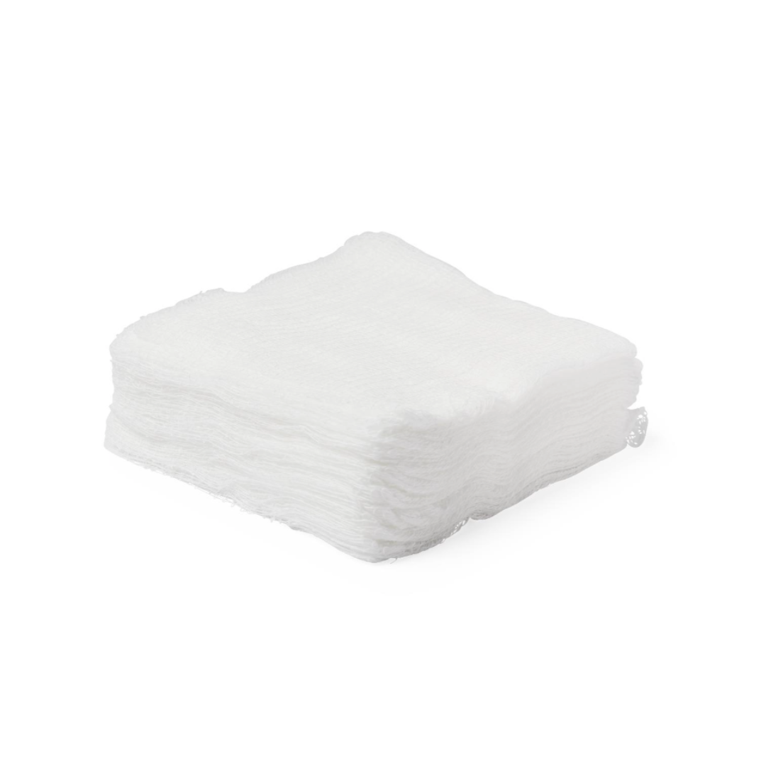 A stack of Medline Nonsterile 100% Cotton Woven Gauze Sponges is neatly arranged on a plain white surface.