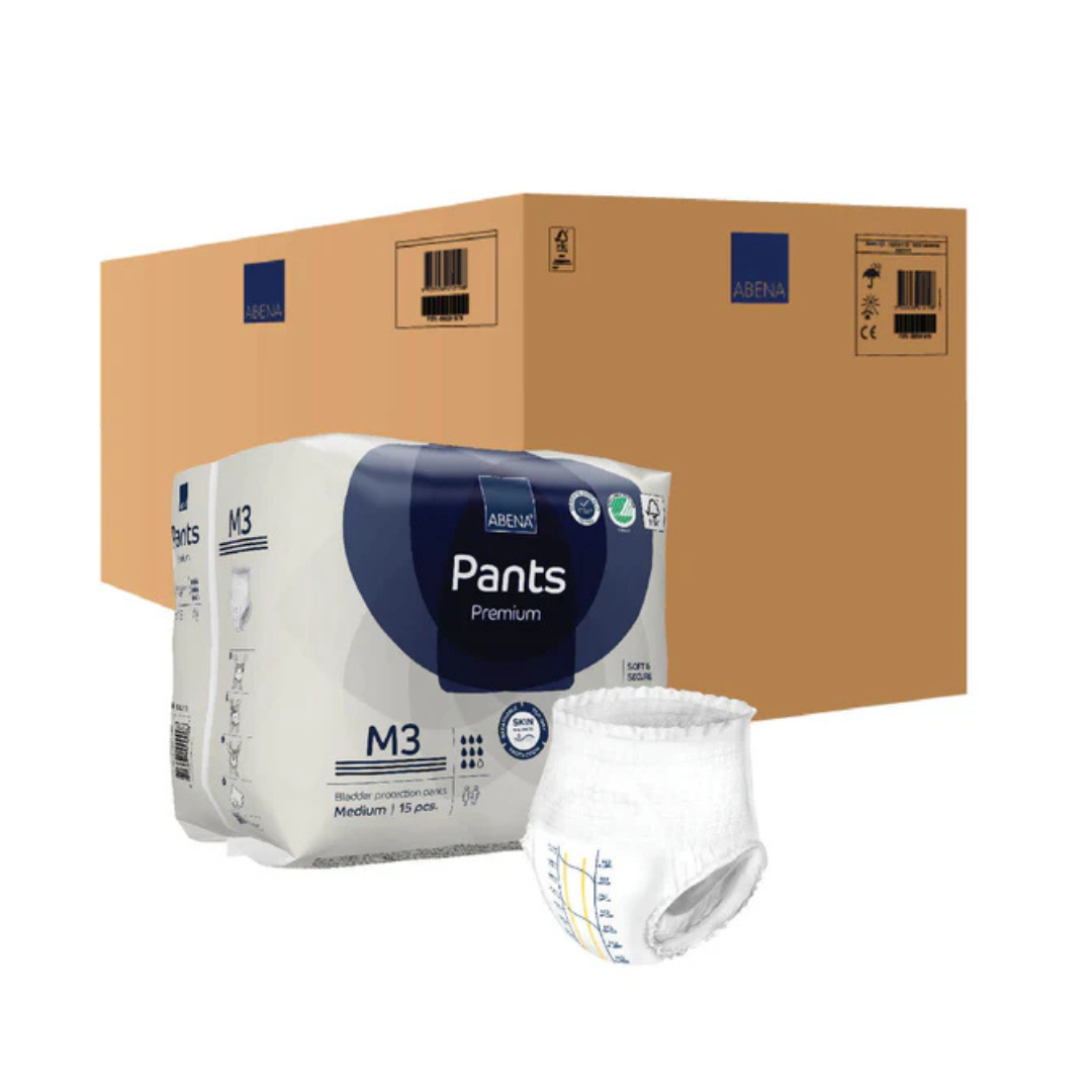A pack and a single Abena Pants Premium Protective Adult Underwear are shown before a large brown shipping box, providing discreet incontinence protection for adults.