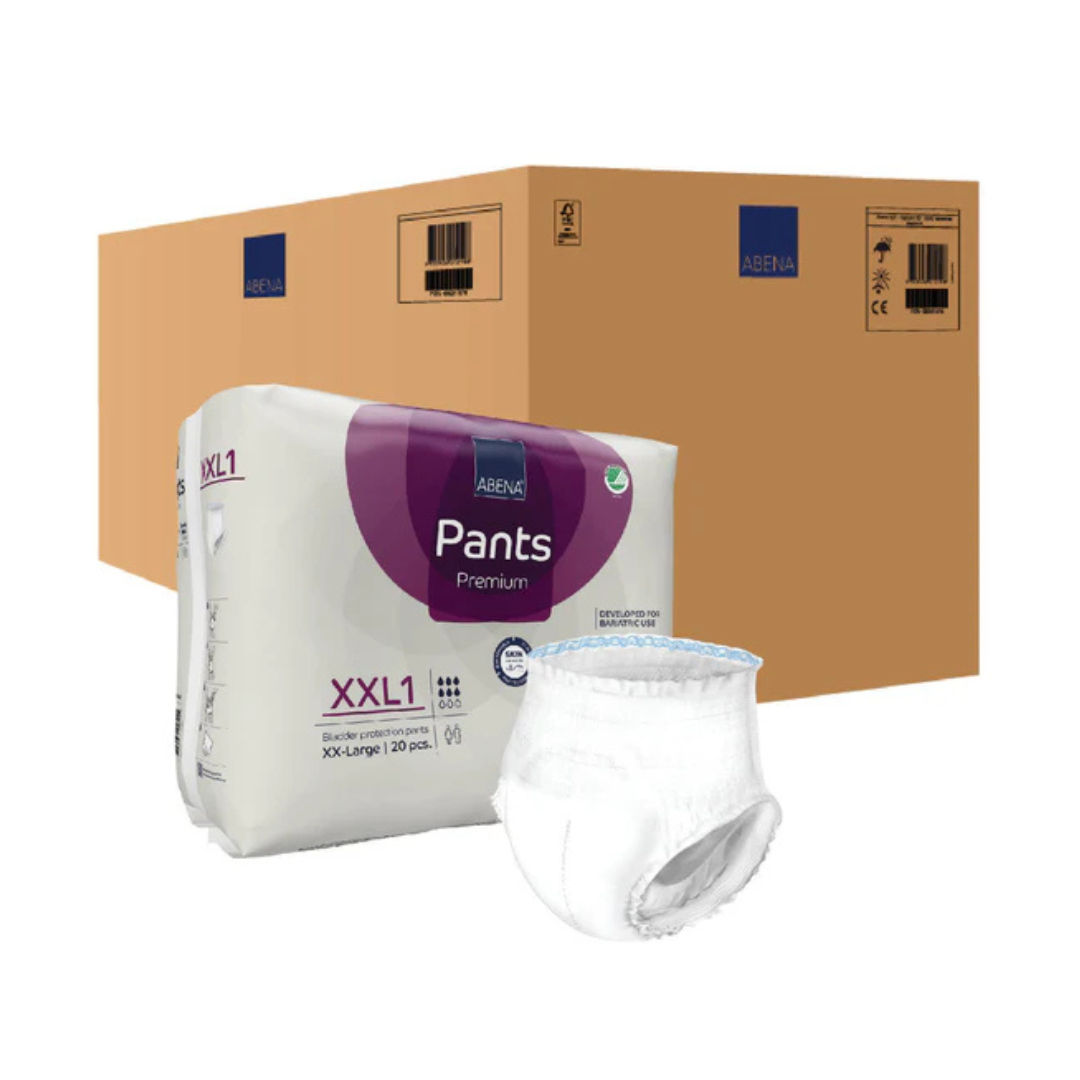A large brown shipping box stands behind a package labeled Abena Pants Premium Protective Adult Underwear, with one white adult incontinence pull-up displayed in front.