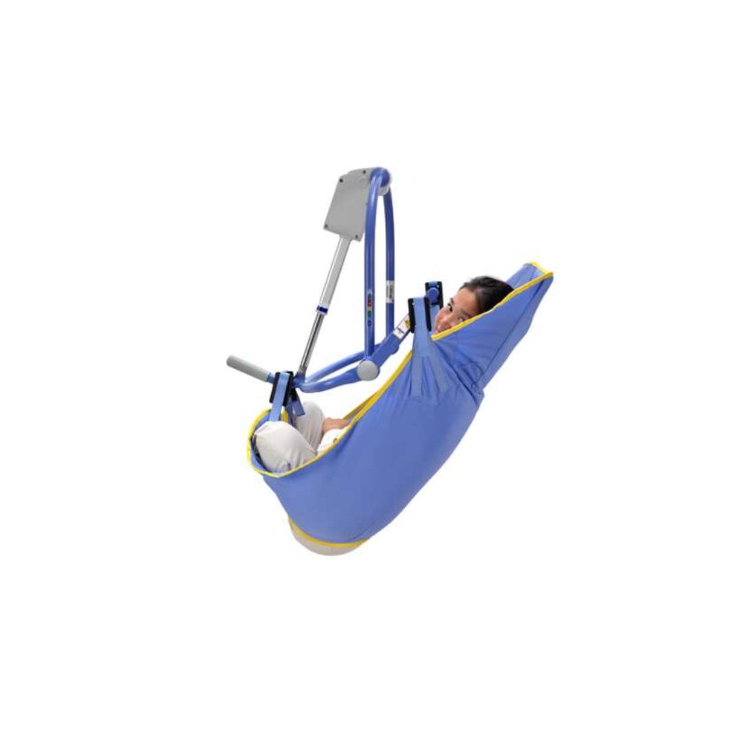 An individual is seated in an ARJO 4-Point Spreader Sling, which features blue and yellow padding and attaches to a mechanical lift for safe, comfortable transfers of those with limited mobility.