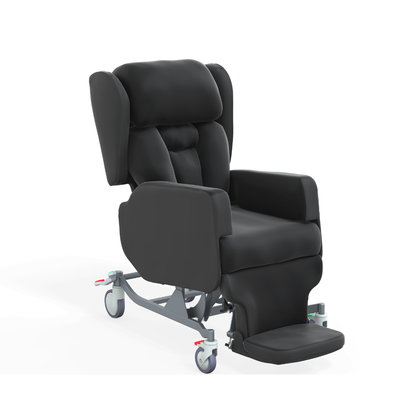 The Accora Configura® Advance Postural Tilt Chair is a black, padded medical recliner with armrests, a high back, footrest, and four lockable wheels for mobility. It features a sturdy metal frame for secure postural care and adaptability.