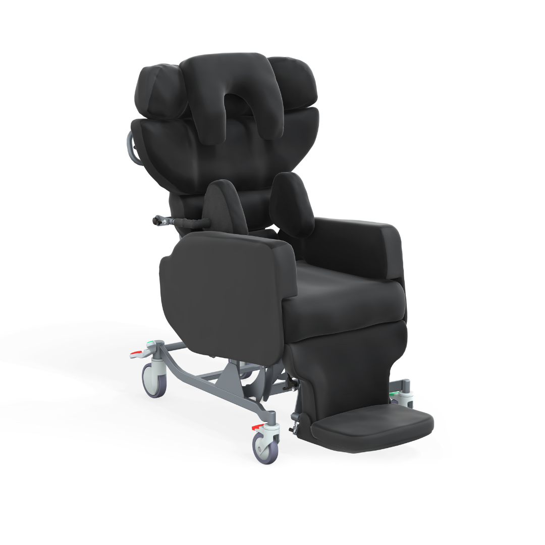 The Accora Configura® Advance Postural Tilt Chair is a black padded medical recliner with head, arm, and leg supports. It features wheels and adjustable components for comfort, mobility, and personalized postural care.