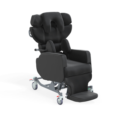 The Accora Configura® Advance Postural Tilt Chair is a black padded medical recliner with head, arm, and leg supports. It features wheels and adjustable components for comfort, mobility, and personalized postural care.