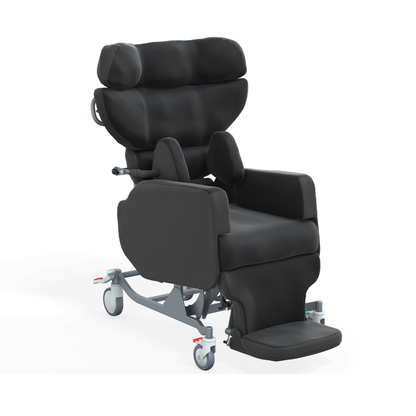 The Accora Configura® Advance Postural Tilt Chair is a black, padded chair with adjustable headrest, side supports, armrests, leg rest, and wheels for comfort and mobility assistance.